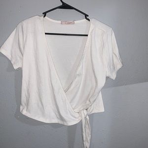 small, white coverup type shirt